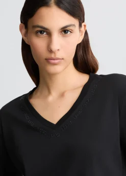 T-shirt con logo e strass