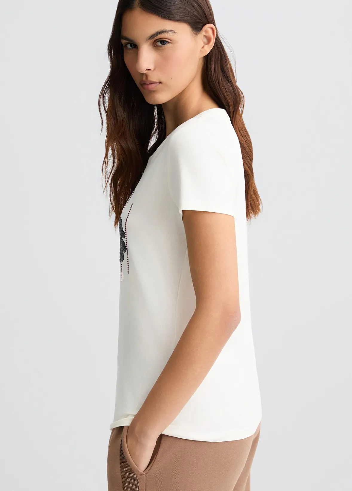 T-shirt con logo floreale e strass