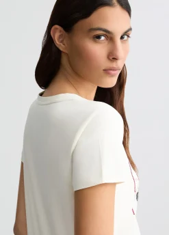 T-shirt con logo floreale e strass