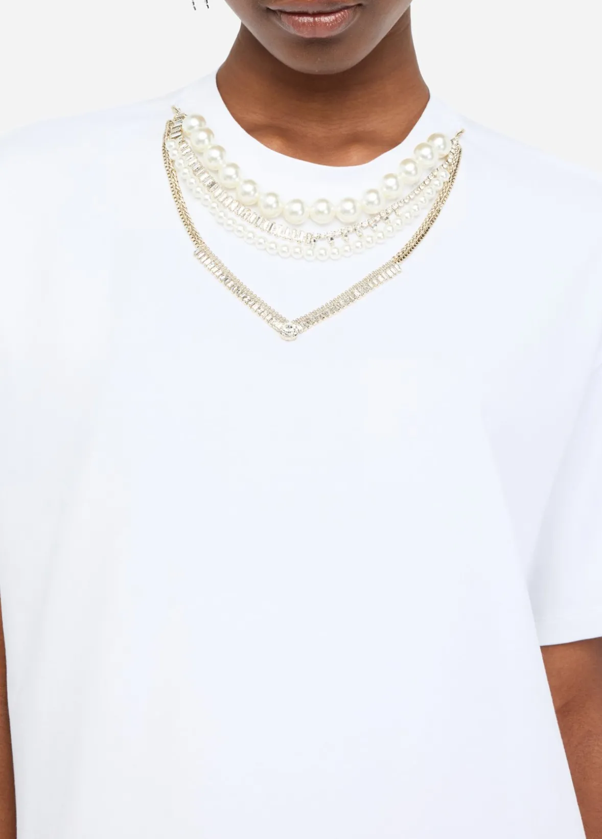T-shirt con perle e strass
