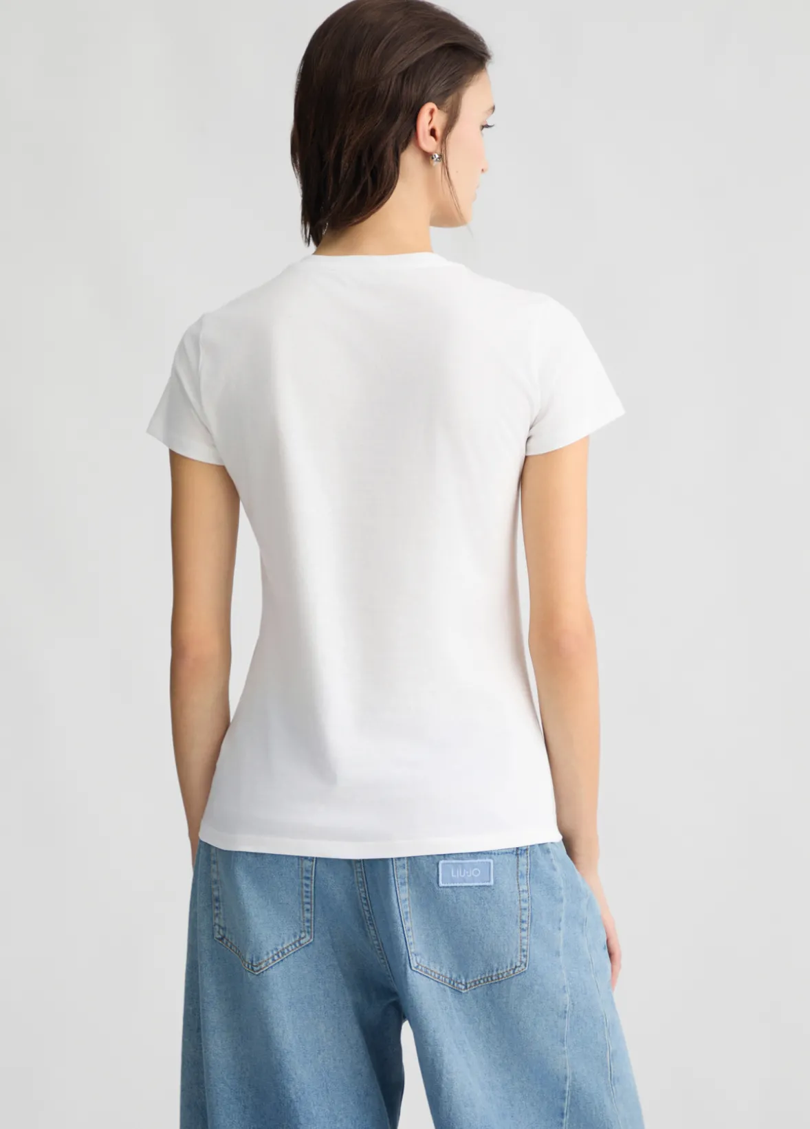 T-shirt con stampa e strass
