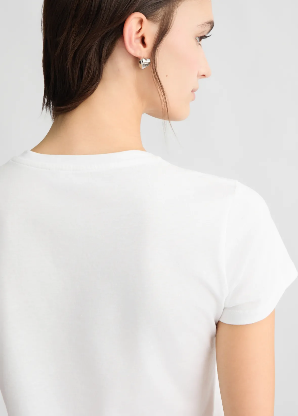 T-shirt con stampa e strass