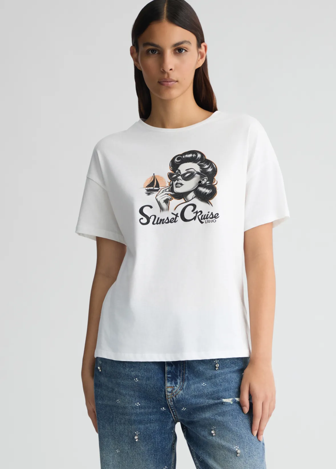 T-shirt con stampa e strass