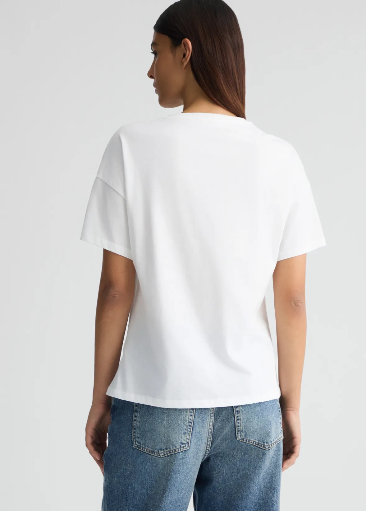 T-shirt con stampa e strass