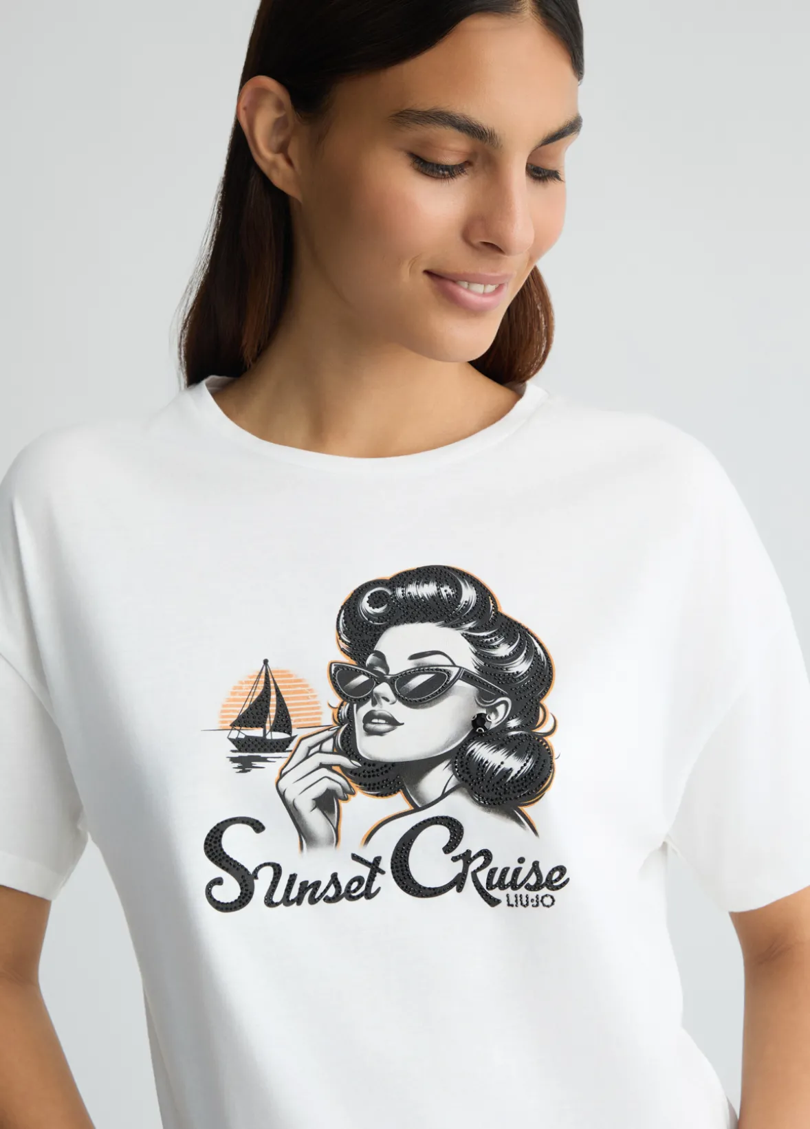 T-shirt con stampa e strass