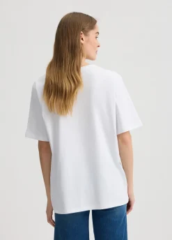 T-shirt con strass e castoni
