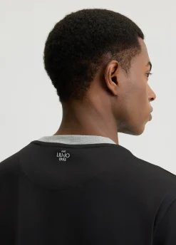 T-shirt con tasca