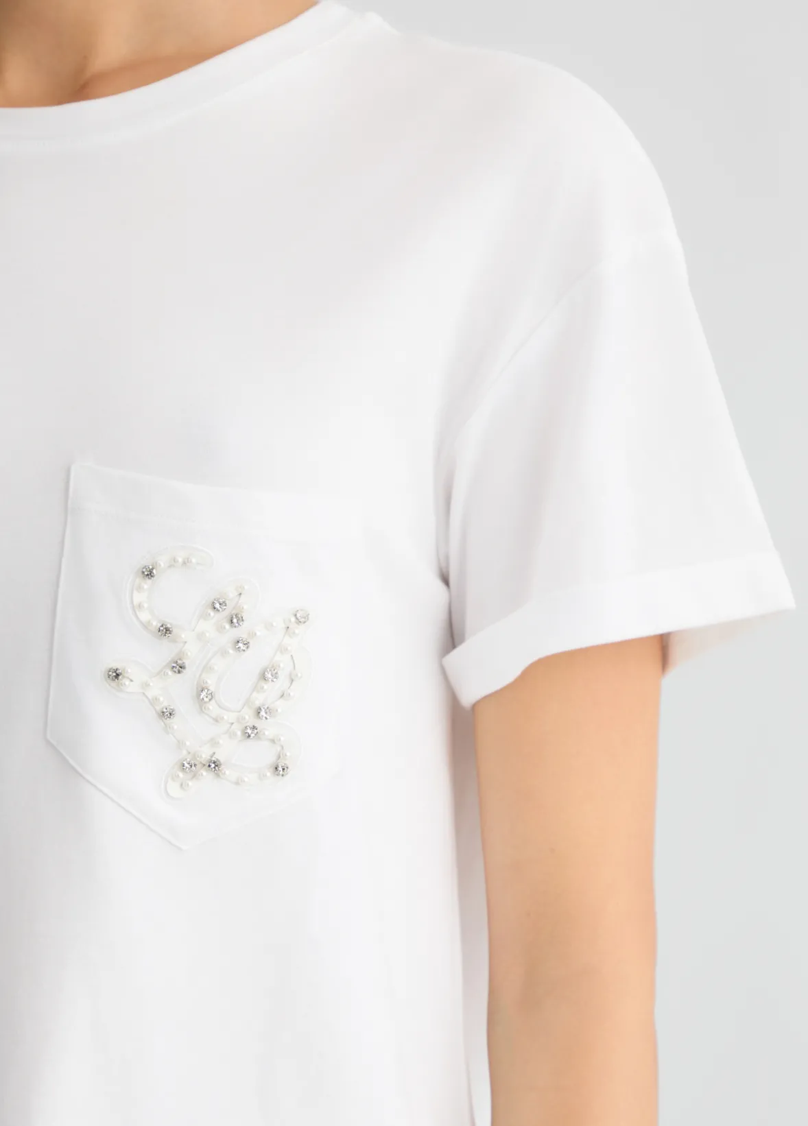 T-shirt con taschino