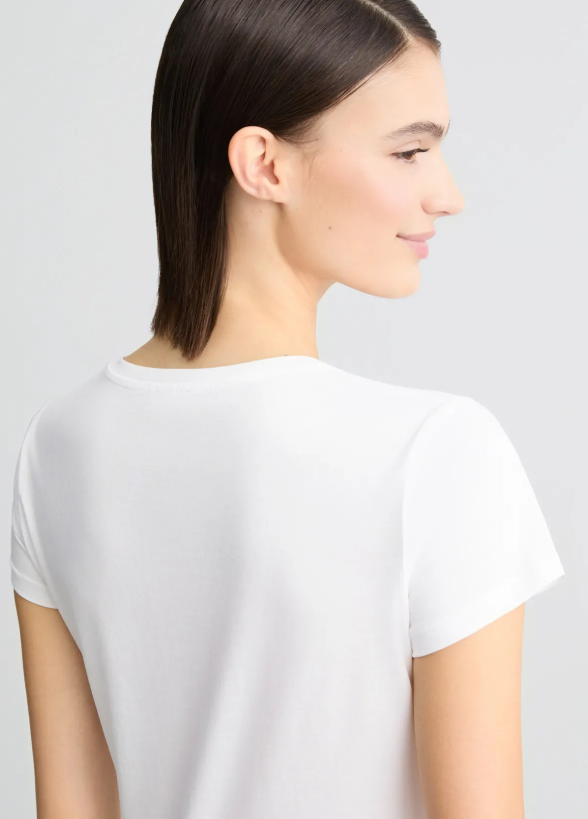 T-shirt in cotone con stampa e strass