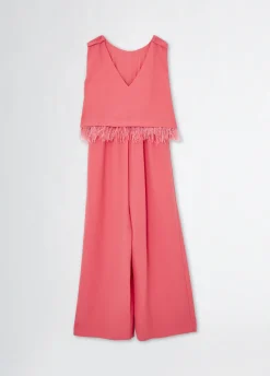 Tuta elegante con piume
